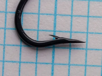 Partridge CS10/1 Bartleet Traditional Salmon Hook — close-up of point and barb geometry — size 2 — superior point with standard barb on measurement grid