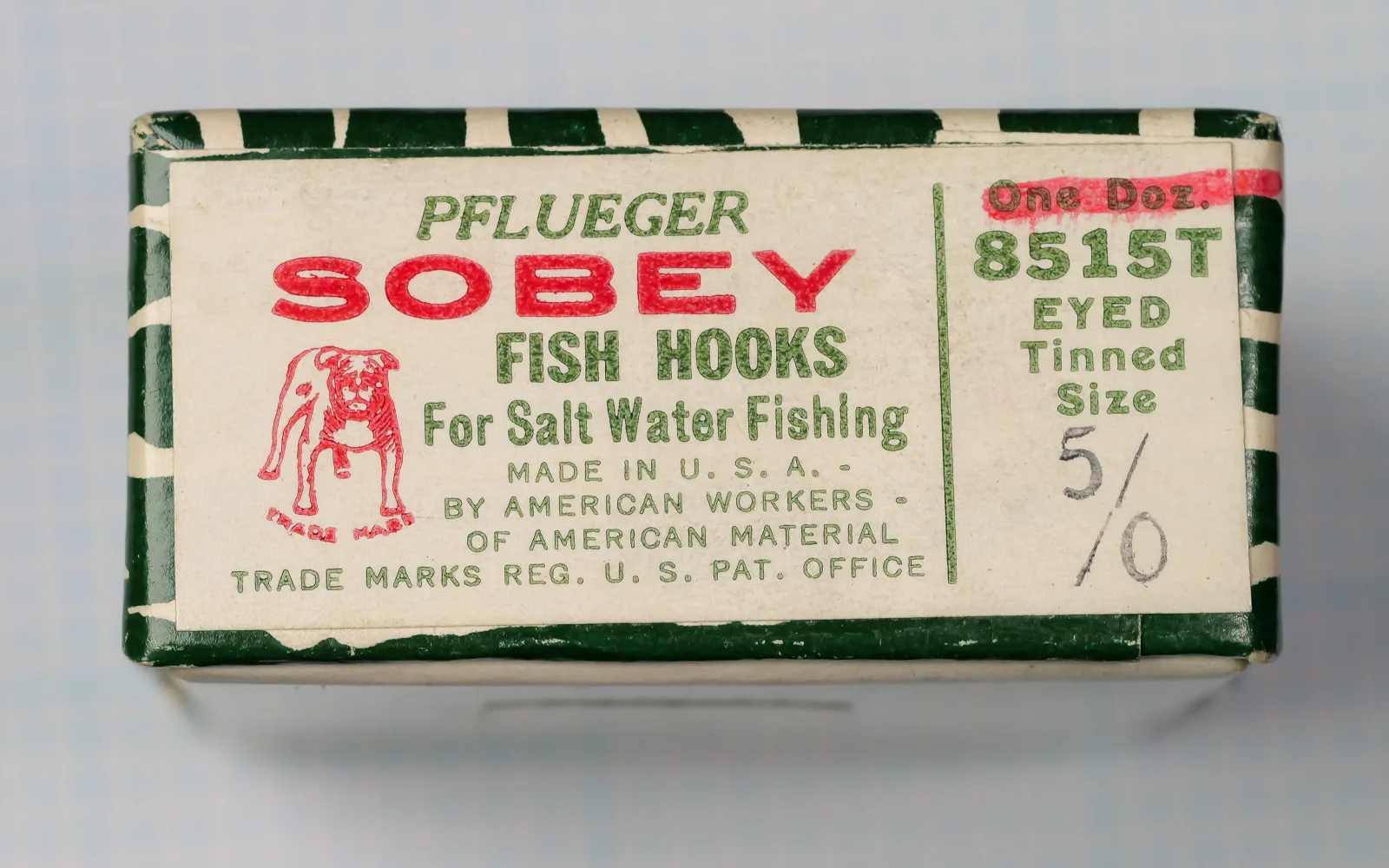 Pflueger Sobey 8515T Size 5/0 — early green-and-white cardboard box with wrap-around lithographed label — bulldog trademark visible — tinned hook
