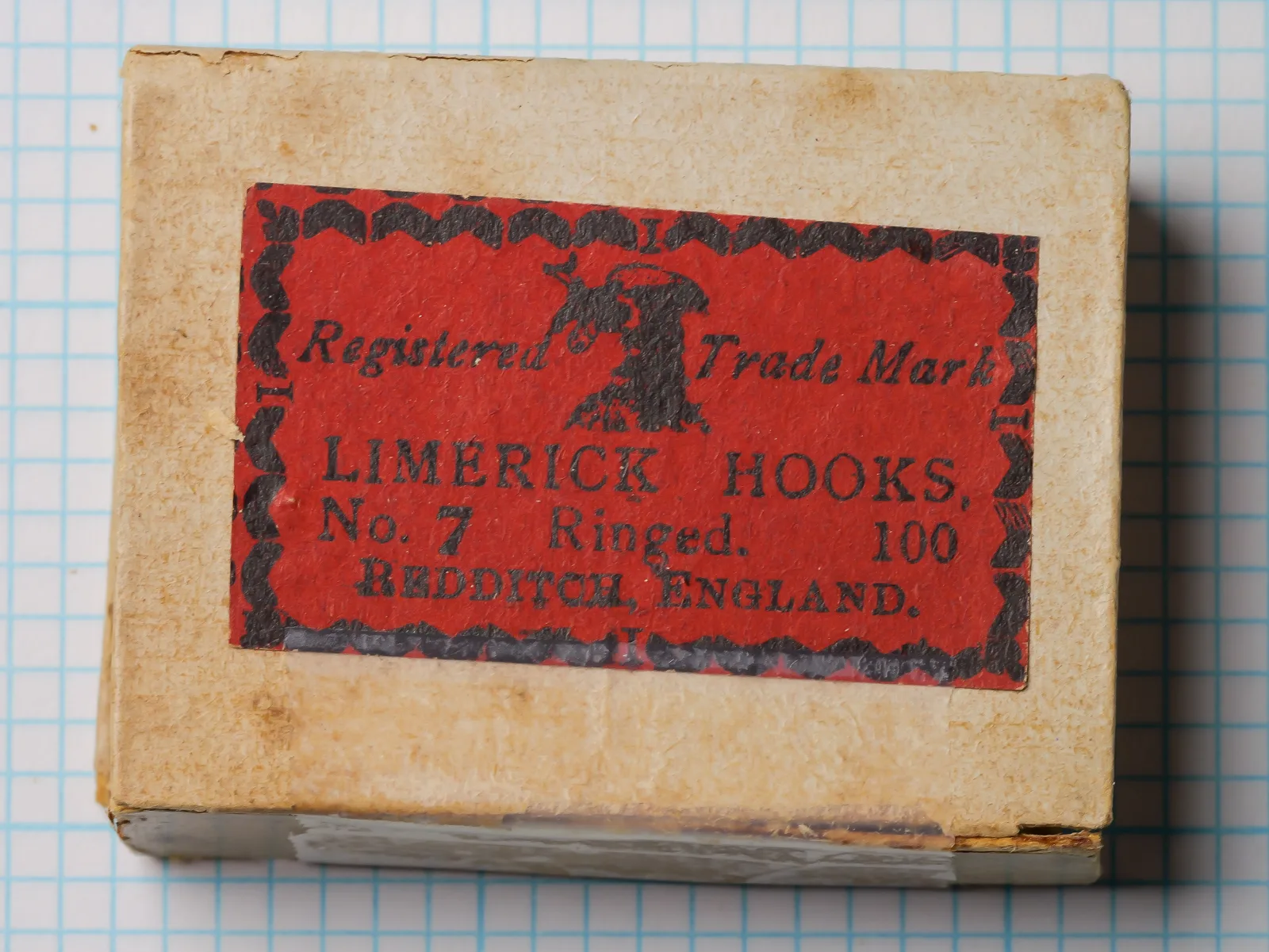 Henry Wilkes Limerick Hook packaging — red-and-black printed label on cream card stock — size 7 — shows maker identification and Redditch origin