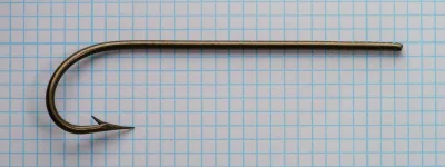 Mustad 3785 — full hook profile from above — size 3/0 — long straight shank, sproat bend, marked shank detail
