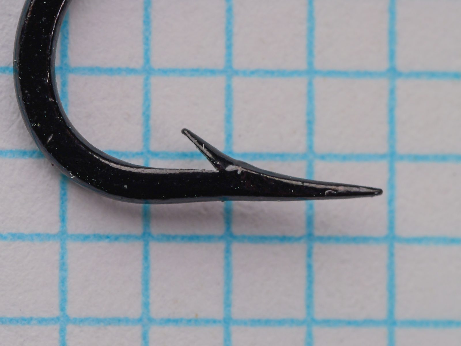 Mustad 38110 O'Shaughnessy Hook — point and barb showing hollow-point geometry — size No. 2 — concave inner taper