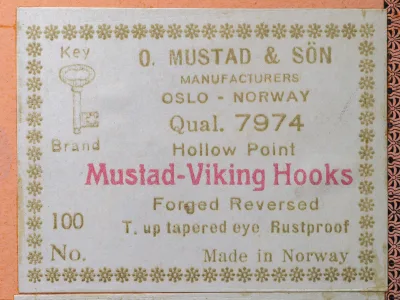 Mustad 7974 Label — full packaging label showing eight-line Mustad standard format with Key Brand logo, Oslo-Norway origin, Quality code 7974, Hollow Point designation, Viking Hooks branding, and complete specifications