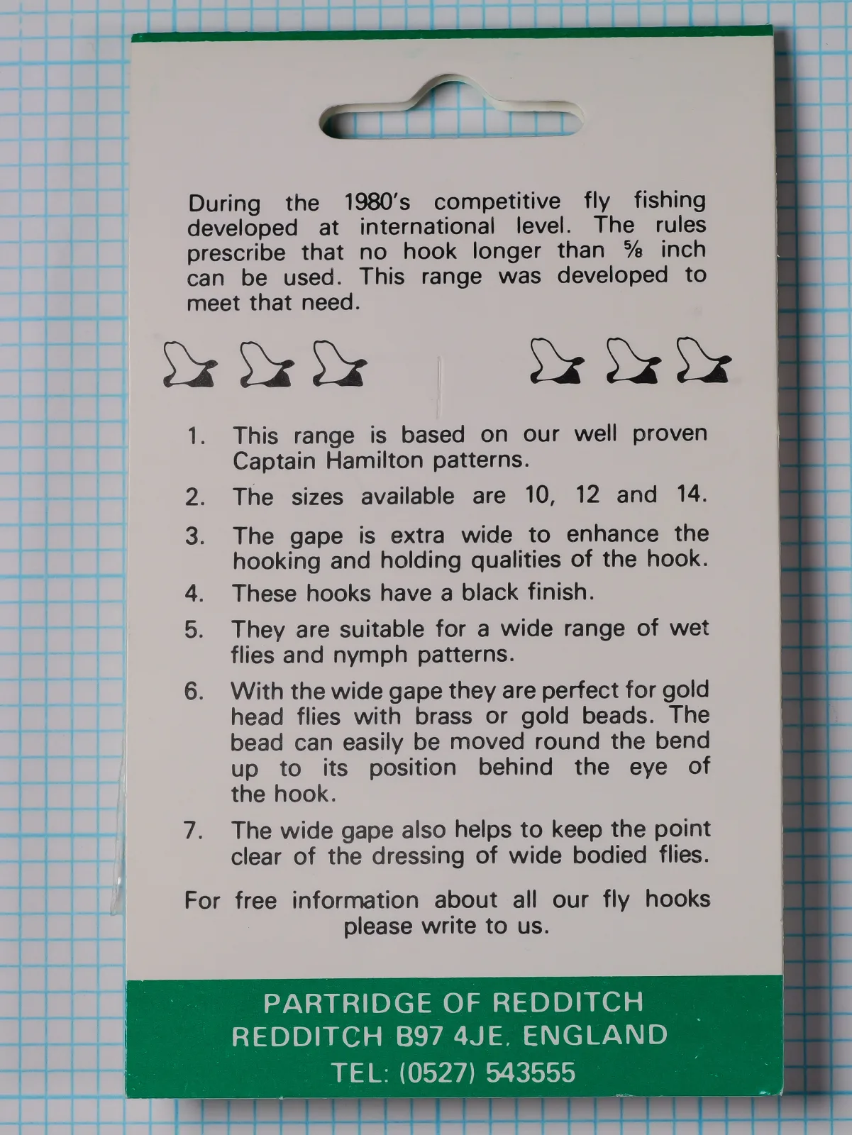 Partridge CS7 MW packaging back panel showing design specifications for Captain Hamilton International Middleweight Fly Hooks, size 10, printed text describing 1980s competition fly fishing development