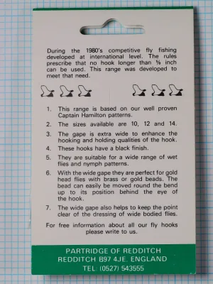 Partridge CS7 MW packaging back panel showing design specifications for Captain Hamilton International Middleweight Fly Hooks, size 10, printed text describing 1980s competition fly fishing development