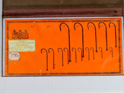 Wm. Bartleet M58 Archer Carlisle Ringed sales card detail — alternate view showing hook size progression and mounting on measurement grid background