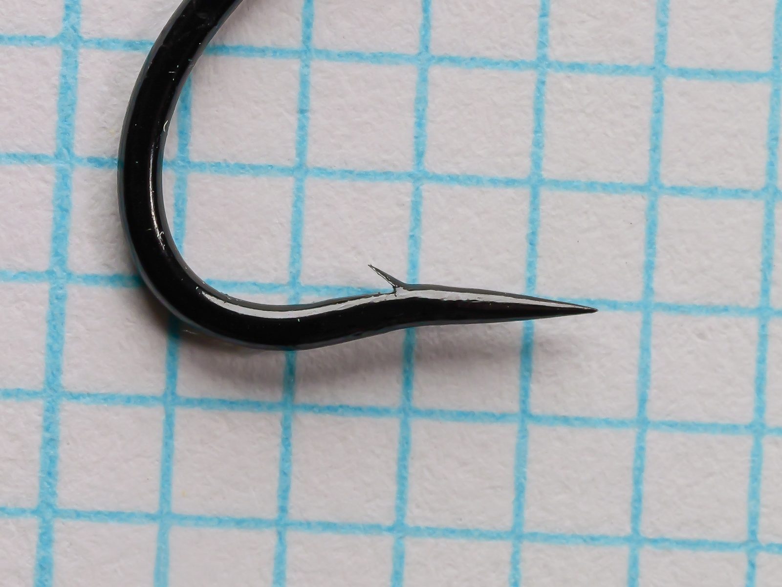 Daiichi 2051 — hook profile showing tapered loop eye and needle point — size 3 — japanned finish, side view