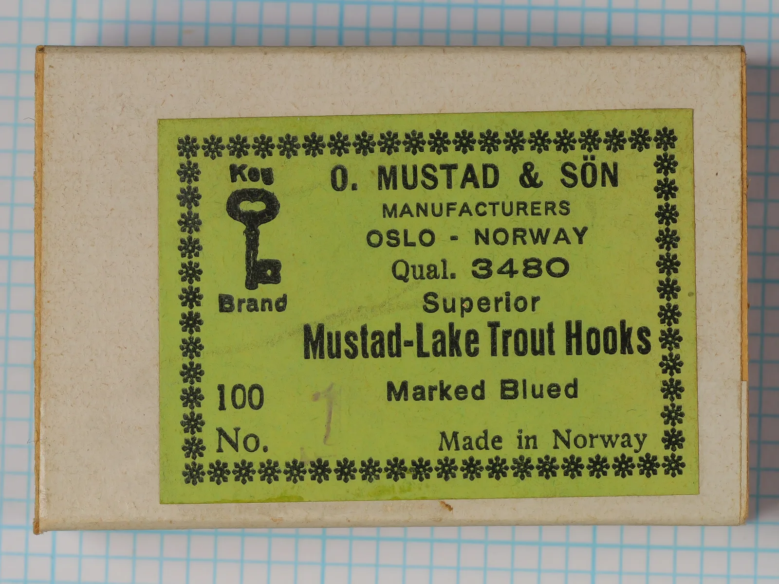 Mustad 3480 Lake Trout Hook — original yellow-green cardstock box with Key Brand logo and eight-line label — size 1 — marked blind eye, blued finish