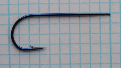 Partridge size 3 blind eye hook — front/face view showing flatted spade eye and eye attachment geometry — Redditch vintage