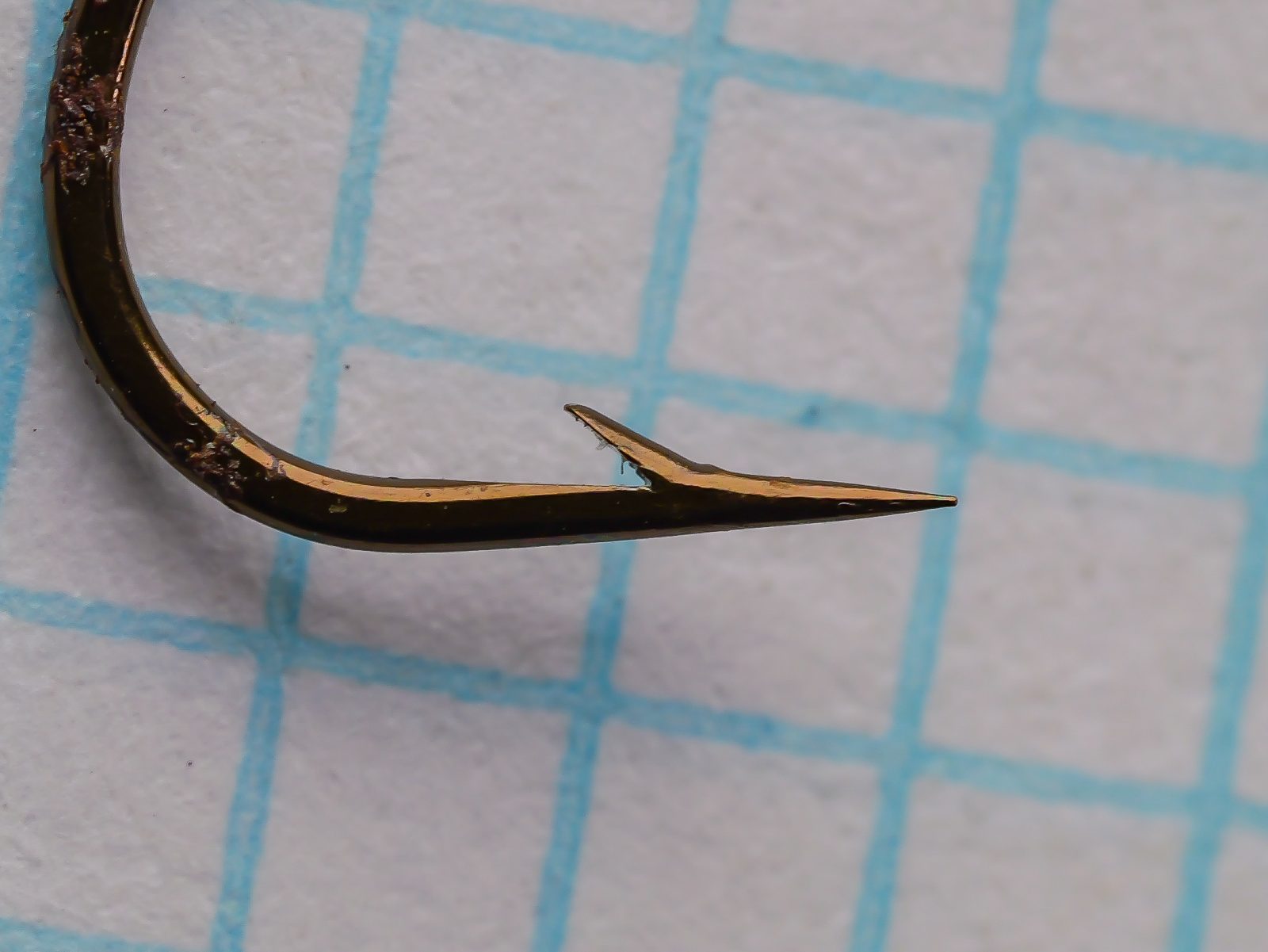Partridge Fine Wire Forged Reversed Size 7 — side profile showing reversed upturned point and fine-wire forged bend geometry — japanned black finish on measurement grid