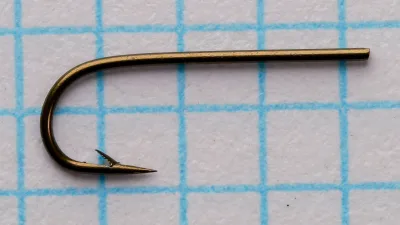 Partridge Fine Wire Round Bend Tapered No. 13 — profile view showing tapered blind eye, round bend, and superior point — size 13 — bronzed finish