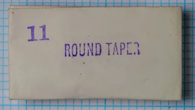 Partridge Round Taper Size 11 — original cream-colored box with hand-stamped purple ink marking '11 ROUND TAPER'