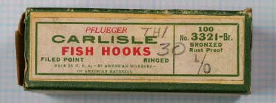 Pflueger Carlisle 3321-Br — original green and tan cardboard box with printed label showing model number and specifications — size 1/0 bronzed finish