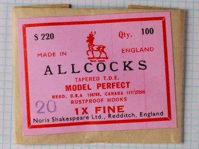 Allcock S 220 Model Perfect packaging — pink label card with red border and Allcock stag logo — size 20 marked in pencil — 100-count Redditch manufacture