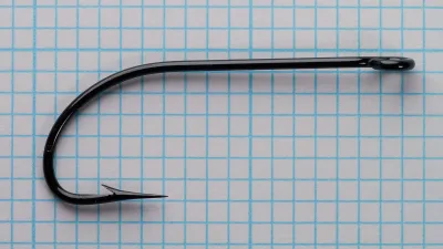 Milward Iron Arm Size 4-0 Limerick Hook — profile view showing Limerick bend and ringed eye on measurement grid