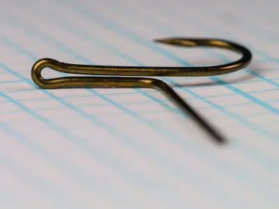 Partridge HE1 Size 12 — detailed view of looped eye construction and parachute post — bronze finish