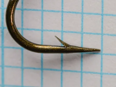 Partridge Kirby Tapered 2/0 — close-up detail showing tapered blind eye and barb placement — point geometry — specimen condition