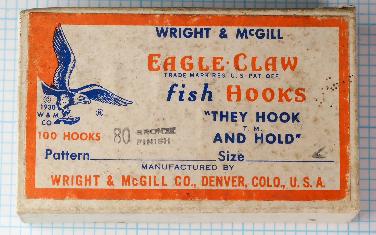 Wright & McGill Eagle Claw No. 80 — original manufacturer box label showing orange and cream packaging with blue eagle logo and 1930 copyright mark — size 2 — 100-hook denomination