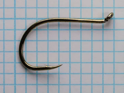Gamakatsu Octopus 02109 — full side view showing turned-up tapered eye, shank, gap width, and hollow point — Size 2 — on measurement grid