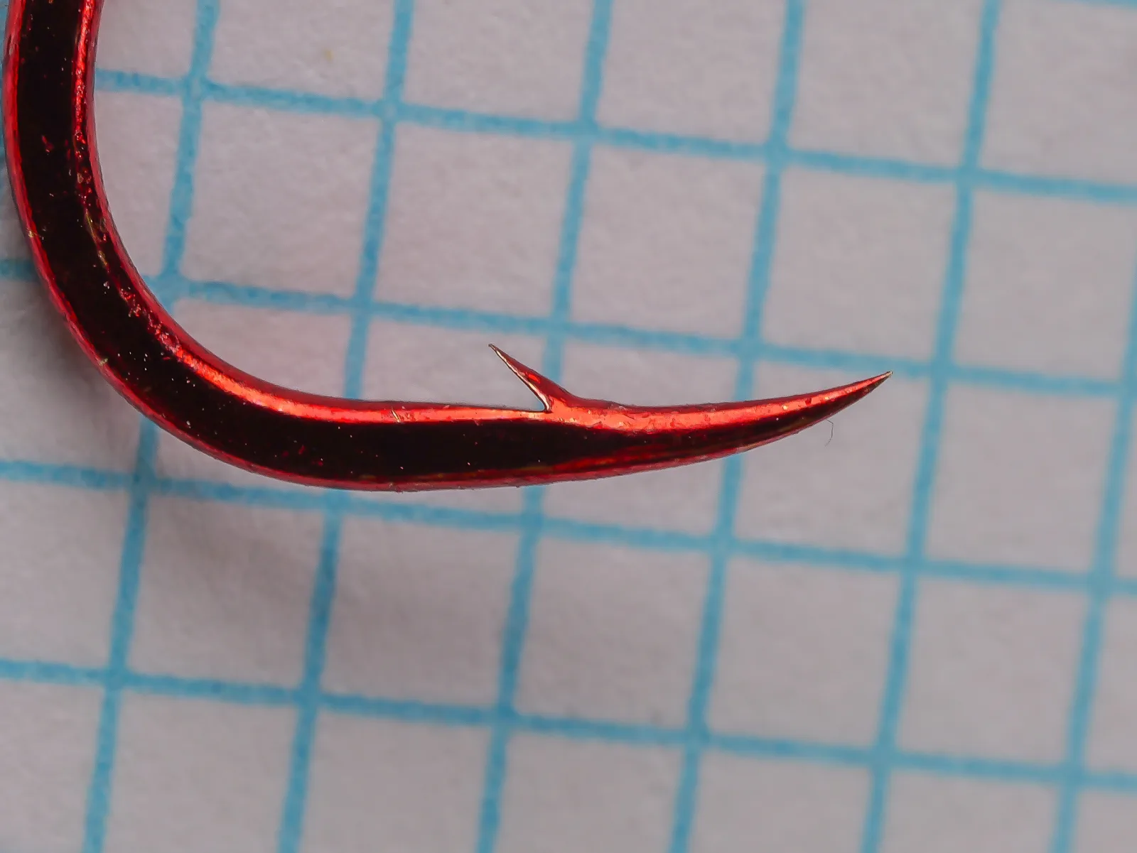 Gamakatsu 02310 Octopus Hook — close-up of hook point and barb — size 1 — red synthetic finish