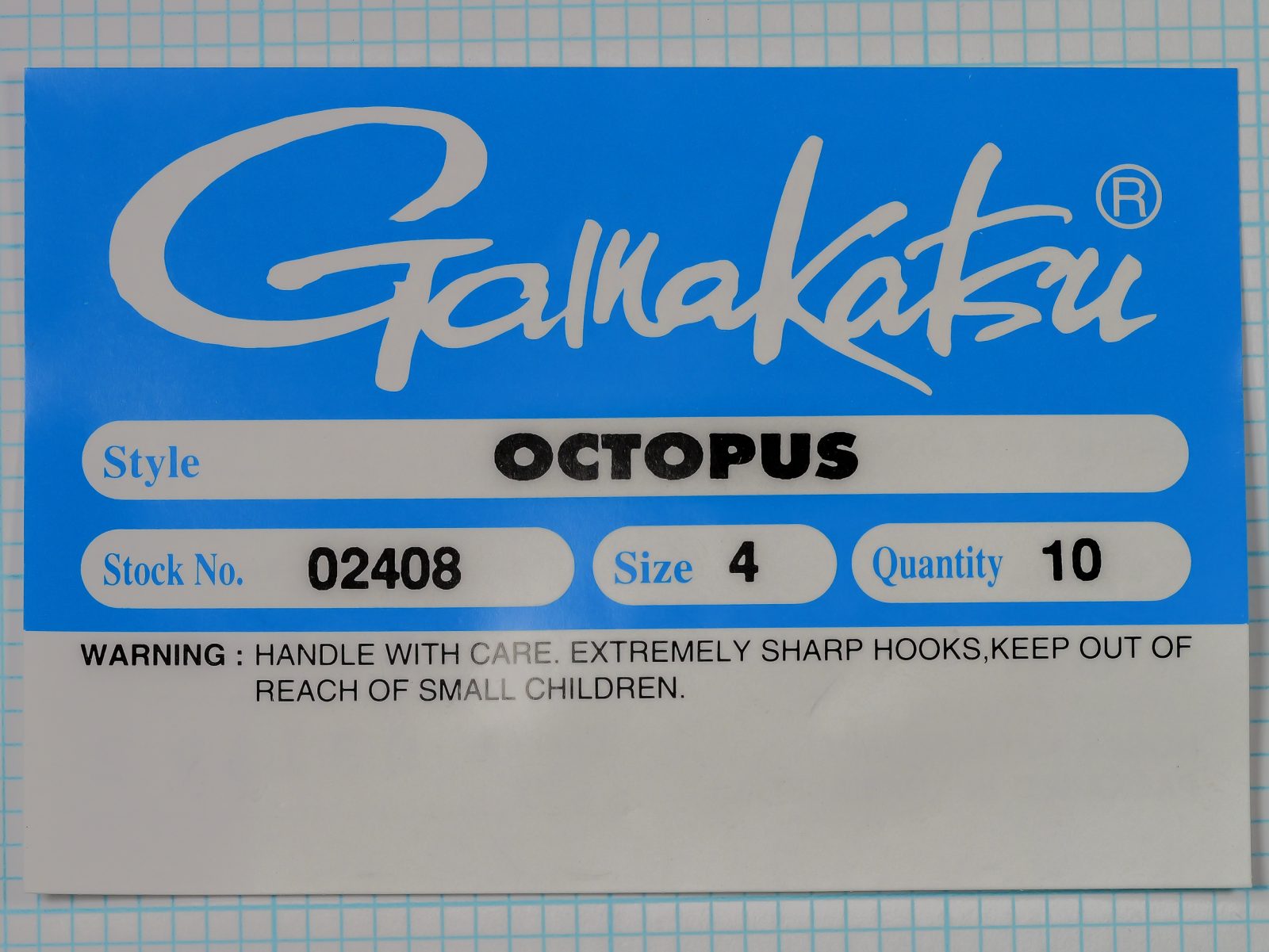 Gamakatsu 02408 Octopus Hook — packaging label back side — corporate text and lot codes — manufacturing and distribution information