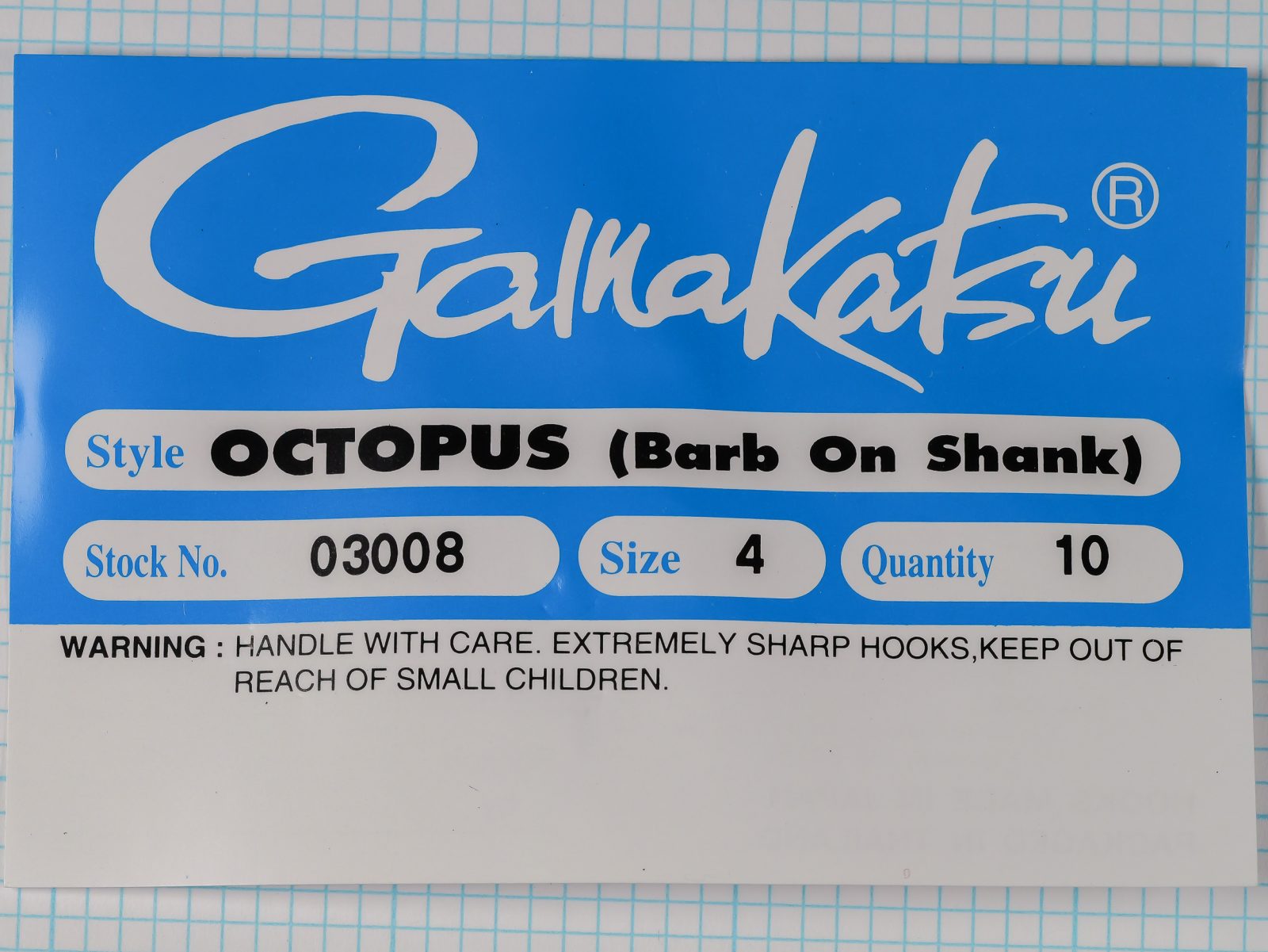 Gamakatsu 03008 Octopus packaging — bright blue sales card with silver logotype and product specifications — size 4 quantity 10
