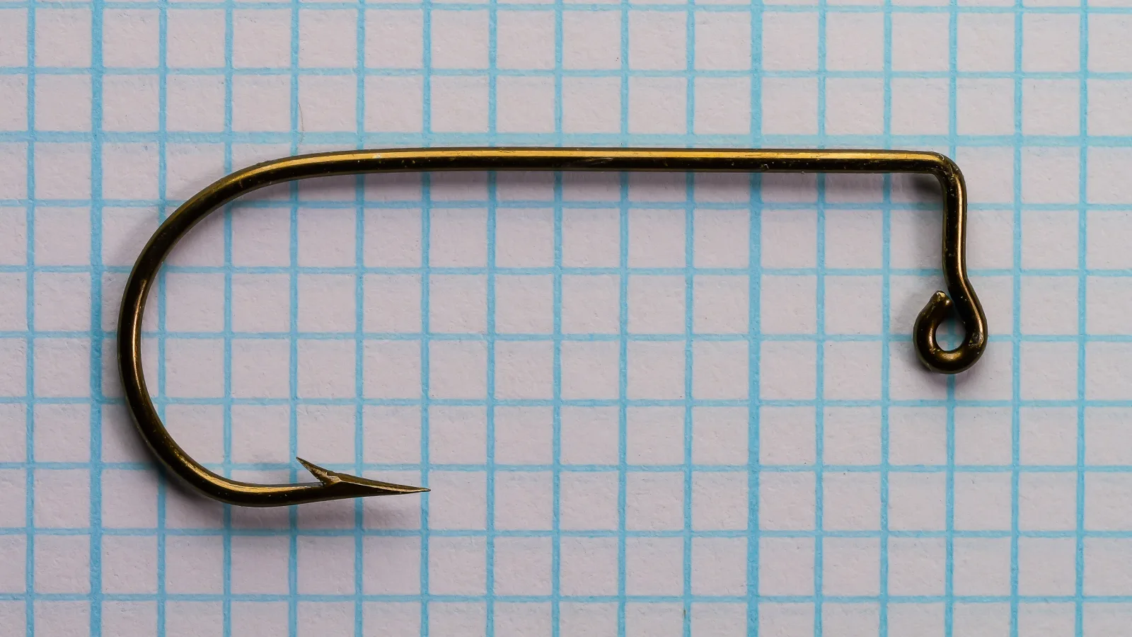 Mustad 32756 Aberdeen Hook — side profile showing jig eye, wide round bend, and bronzed finish — size 1/0 — on measurement grid