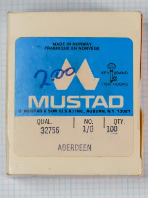 Mustad 32756 packaging label — Key Brand blue label with cream mountain logo — size 1/0, 100-hook card — handwritten specifications