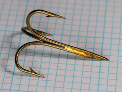 Mustad 3601 Treble Hooks — side profile showing three Sproat bends and tapered eye — size No. 2 — bronzed finish with hollow points