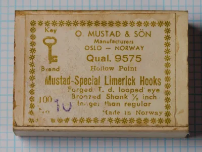 Mustad 9575 Mustad-Special Limerick — original manufacturer box label — size 10, 1/2-inch larger shank variant — Forged Turned-Down Tapered Eye, Hollow Point, Bronzed Finish, 100-hook box, Made in Norway