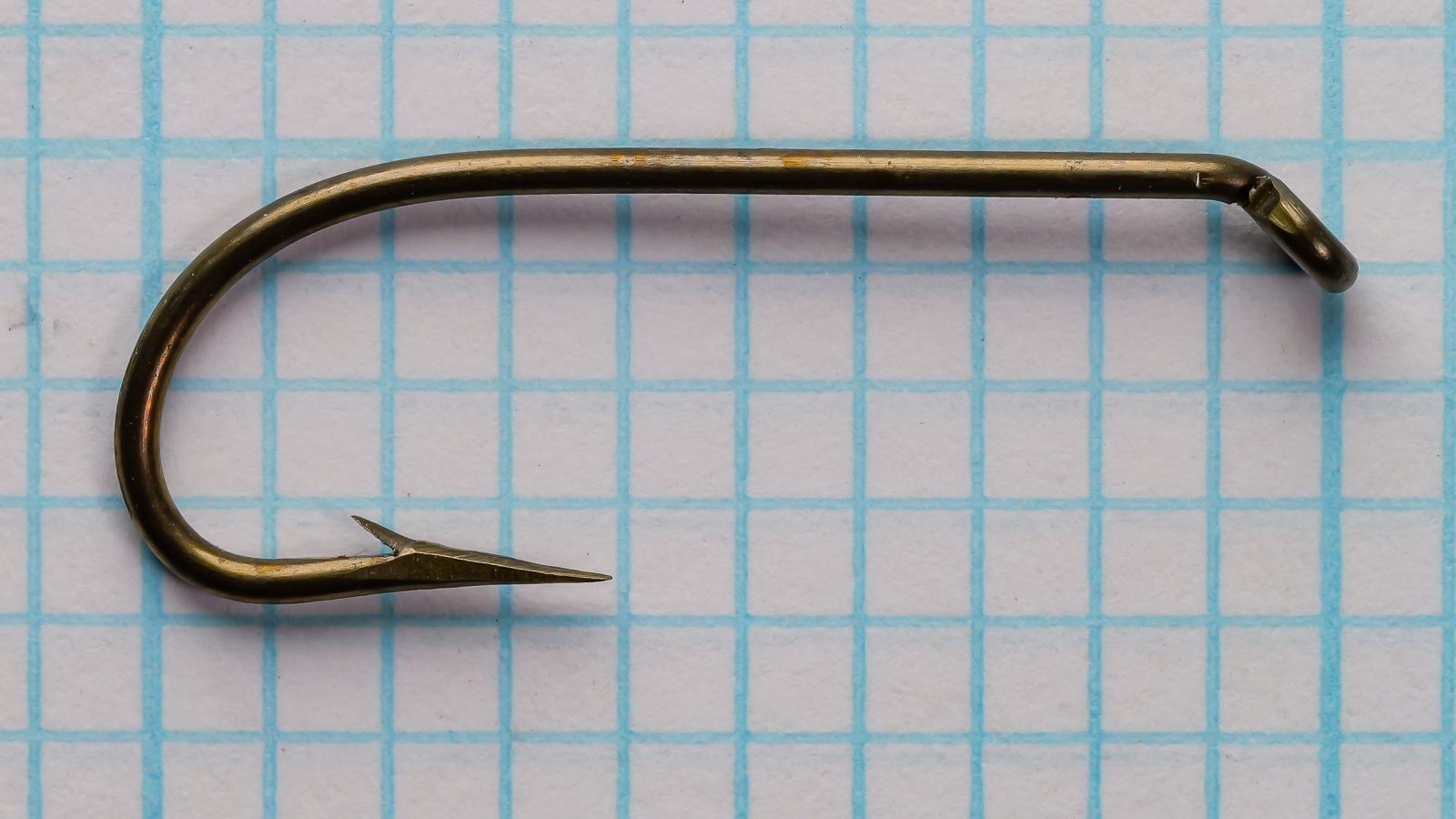 Eagle Claw 1197N Size 4 hook — close-up front face on measurement grid — bronzed finish showing Sproat bend and turned-down ball eye
