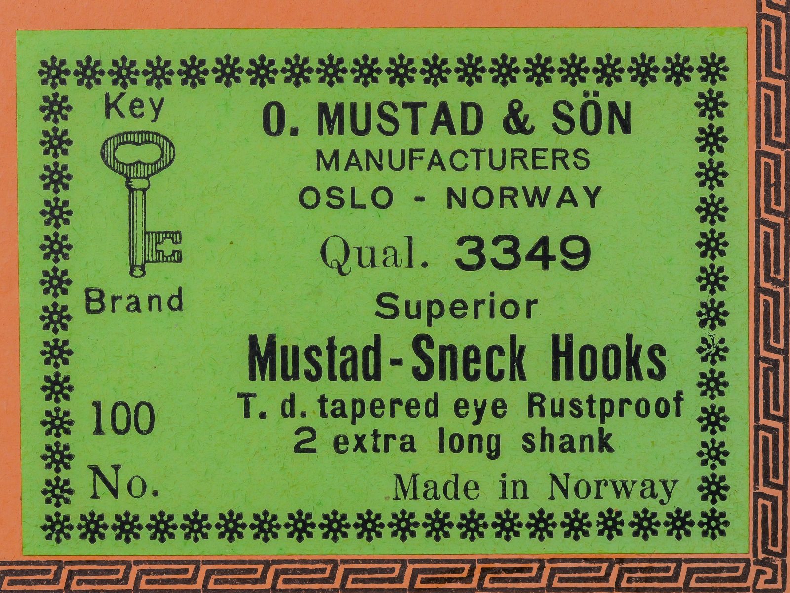 Mustad 3349 sales card label — lime-green background with black letterpress text — manufacturer information and product specifications
