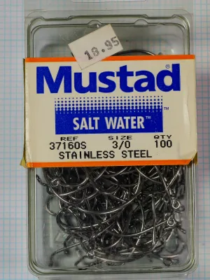 Mustad 37160S package — full clamshell view showing plastic container with adhered label and visible hooks inside