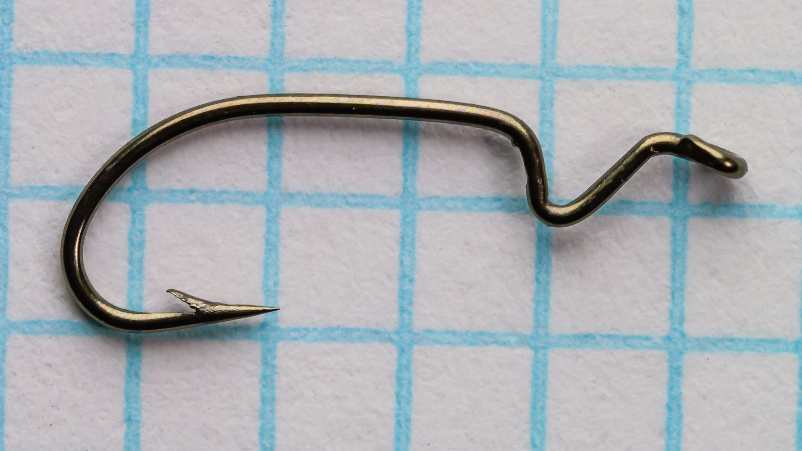 Partridge K3A Swedish Dry Fly Hooks — single hook showing side profile emphasizing shank length and bend depth — size 18 — bronzed sproat bend