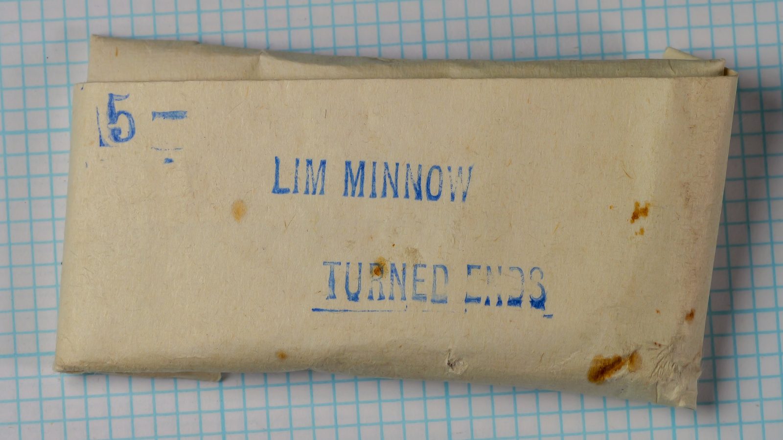Partridge Limerick Minnow Turned Ends — original cream-colored paper envelope with blue letterpress printing — size 5 — showing packaging details