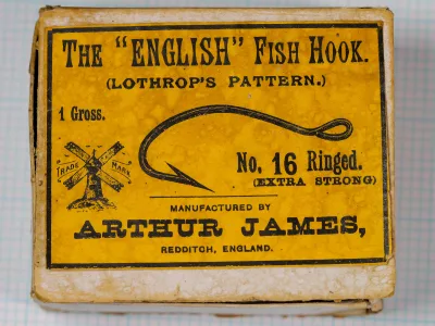 Arthur James vintage hook box label for Lothrops Pattern size 16, yellow with black text and windmill trademark.