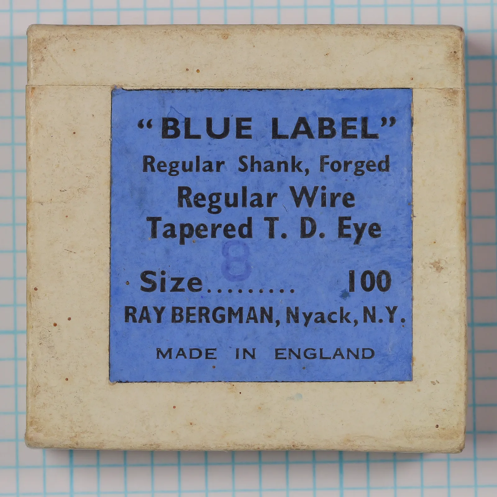 Blue Label hook box — printed label showing model specification and Ray Bergman attribution — size 8 — bronzed forged hook box