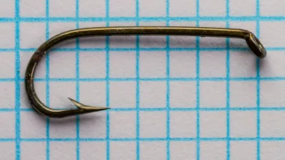 Bergman Nyack Extra Stout size 8 hook, bronzed finish, sproat bend, straight eye, viewed from side.