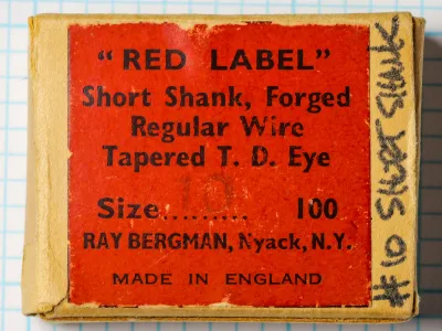 Bergman Red Label box label — front packaging panel showing red label with black letterpress text, wood-grain wrapper, specifications and manufacturer details