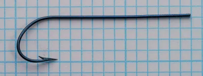 Milward Carlisle Size 1 — blued hook specimen on measurement grid — front profile showing blind-marked shank and deep rounded bend