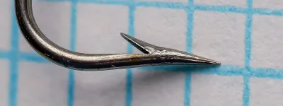 Milward 3719 Indiana Bass Hook — profile view of bend — bright steel finish — showing Kirby offset geometry and standard-length shank