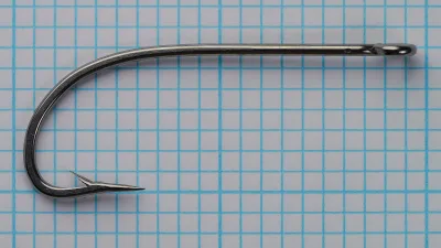 Milward 4095 O'Shaughnessy Hook — size 3/0 — bottom face showing barb angle and spear point geometry