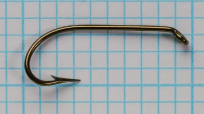 Mustad-Best Kirby Hooks size 8 — dorsal (top-down) view — kirby offset geometry — superior point detail — hook ply visible