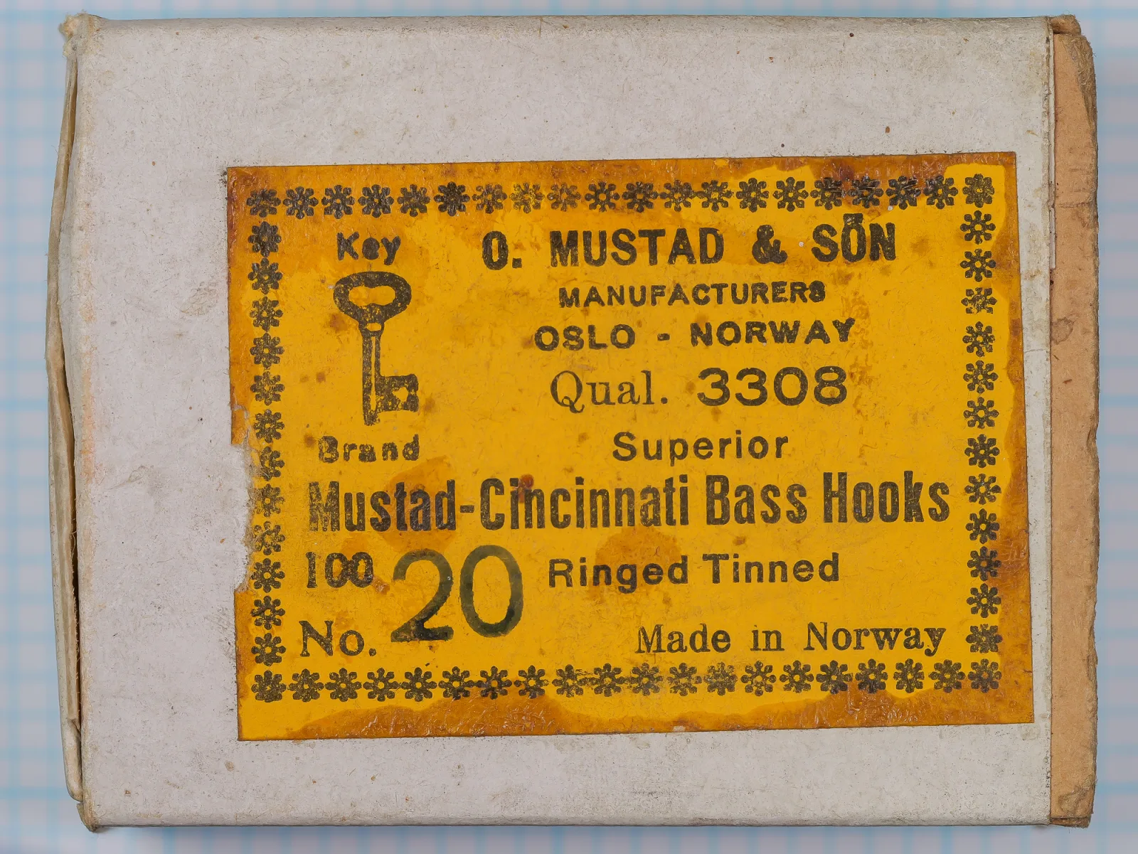 Mustad Model 3308 Cincinnati Bass Hooks — top view of original manufacturer box showing printed yellow label — size 20 — tinned finish