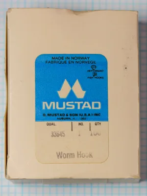 Mustad 33645 Worm Hook — original manufacturer box exterior with blue label panel — size 4/0 — bronzed finish, 100-pack