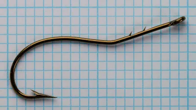 Mustad 33645 — front profile with barb and point geometry visible — extra-fine wire — superior point style