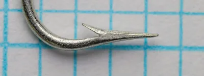 Mustad 3368 Superior Sproat Hook — side profile showing bend geometry, straight ball eye, and extra-fine wire gauge — size No. 2 — bright tinned finish — on measurement grid