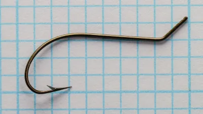Mustad 3840 size 9 sproat bend hook, bronzed finish, straight eye, hollow point.