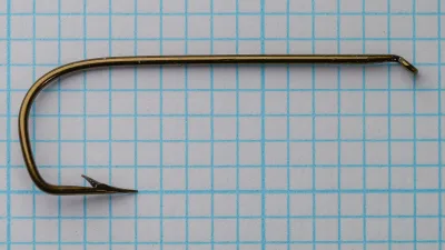 Mustad 3871 Pennell Sneck hook full profile showing turned down eye and bend