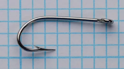 Mustad 4211 Kendal Kirby Hook — full-length side view on measurement grid — size 8 — showing 1X long shank, ball eye, round bend geometry
