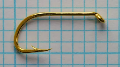 Mustad 92627 Flounder — hook specimen, full profile on measurement grid — gold-plated finish — size 6 — overall length and gap width calibration